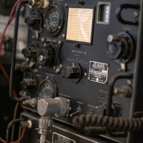a-close-up-of-a-radio-with-a-lot-of-wires-4ZHg6OytifQ